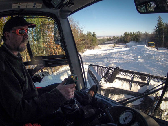 Kevin Freer operated one of two groomers out pushing the snow onto the trails.