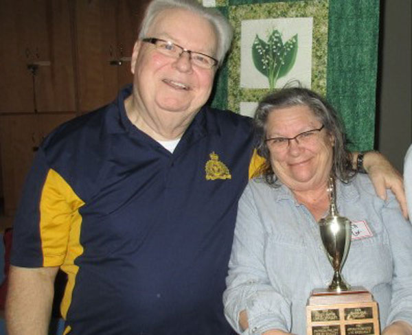 John Brummell with winner Judith Cox at the Stittsville Goulbourn Horticultural Society meeting on February 20.