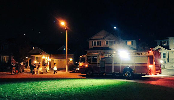 Firefighters from Station 81 cruised the streets blasting the Ghostbusters theme song on October 31. Photo by Erika Adams Mozota.