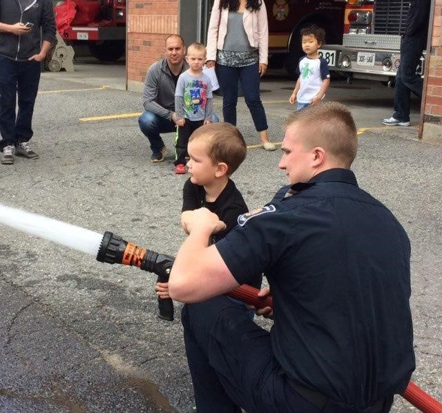 Braeden Mason with Firefighter Josh.