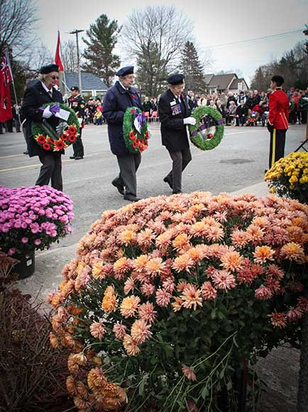 STITTSVILLE, ON. November 11, 2015. Vetrans placing wreaths at the Cenetoph. (Barry Gray/ StittsvilleCentral)