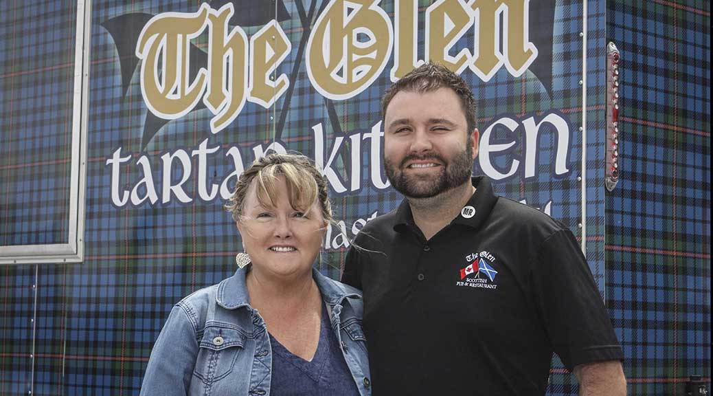 Owner of the Glen Restaurant Kathleen McConville and her son James Clarke in front of the Glen's Tartan Kitchen food truck in the parking lot at Rona on Hazeldean Road. Photo by Barry Gray.