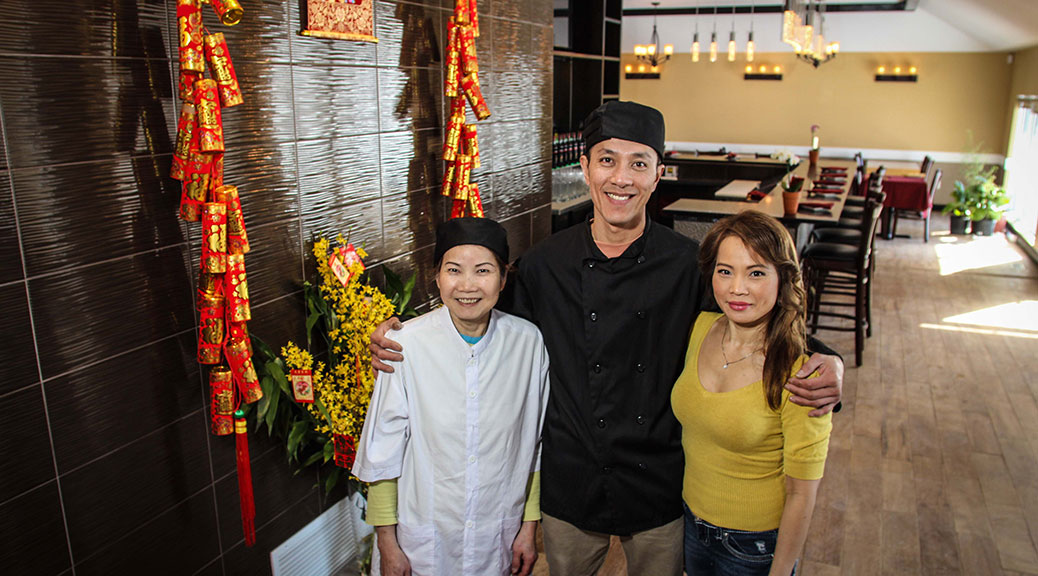The long-awaited “An” restaurant on Carp Road near Hazeldean is set to open on February 25. Taking a break from last minute preparations is Chef/Owner Cuong Tran (center) flanked by Ann Lu (left) and wife Kim Lu (right.) (Photo by Barry Gray/For StittsvilleCentral.ca)