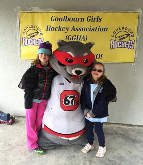 Riley Raccoon visits the Goulbourn Girls Hockey Rockets Fun Day. Photos via Cobina Delaney.