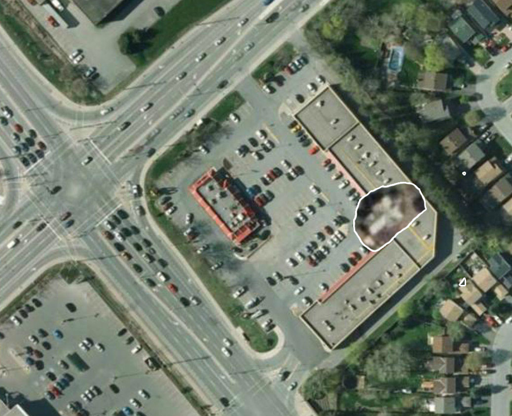 A GeoOttawa 2011 aerial photo showing the same property today. The location of the house is in the inlay on the photo, to show where it would have stood in relation to the current plaza.