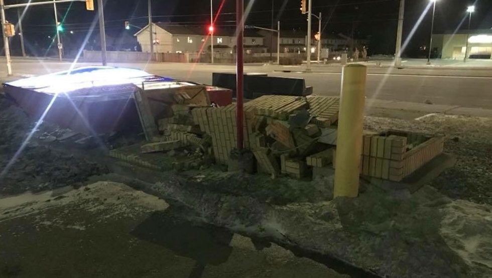 Heavy winds knocked over the Mattress Mart sign at Terry Fox and Hazeldean. Photo via Jaime Robinson on Twitter.