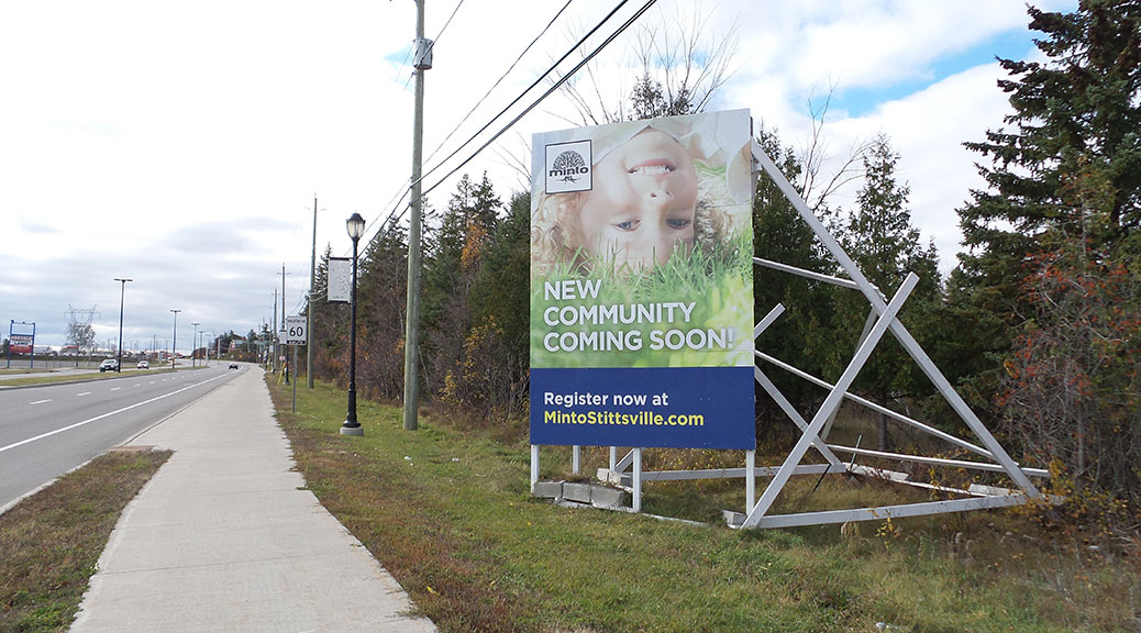 Sign for Minto's Potter's Key neighbourhood