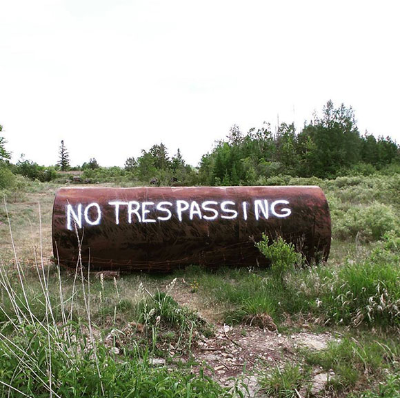 No trespassing oil barrel along the Trans Canada Trail.