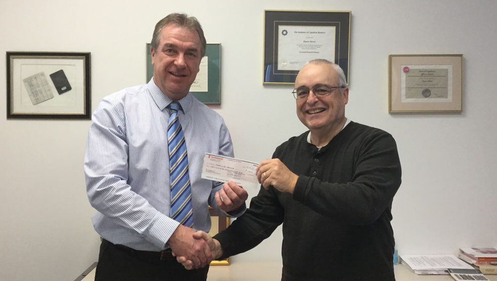 Duane Morris (left), Richmond Branch Manager, is proudly handing over a $5000 sponsorship contribution to Tino Bevacqua member of the 200th Organizing Committee.