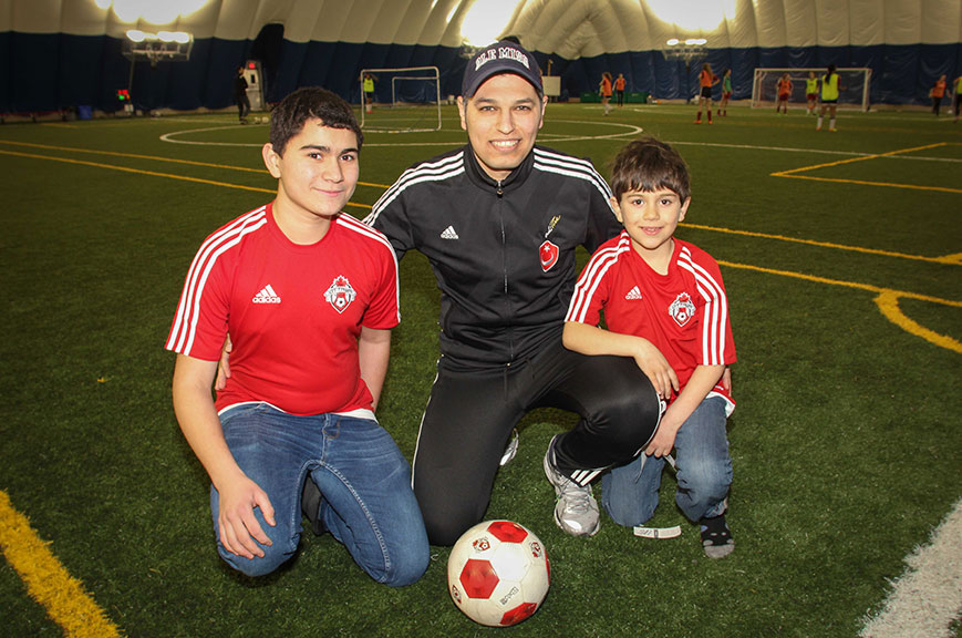 Eihab Altalli (left) and Obai Altalli (right) from Syria, along with Ahmed Aref from West Ottawa Soccer Club. Photo by Barry Gray.