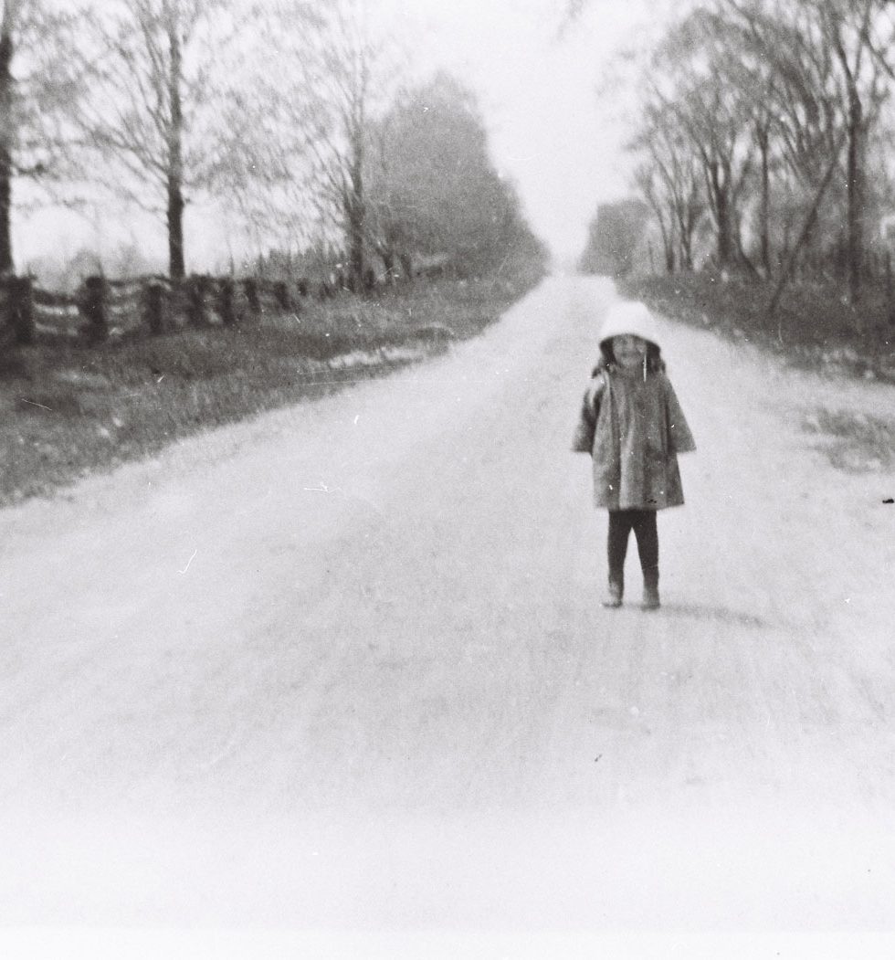 A child standing on what's now Hazeldean Road, east of Terry Fox. Photo from the collection of Roger Young.