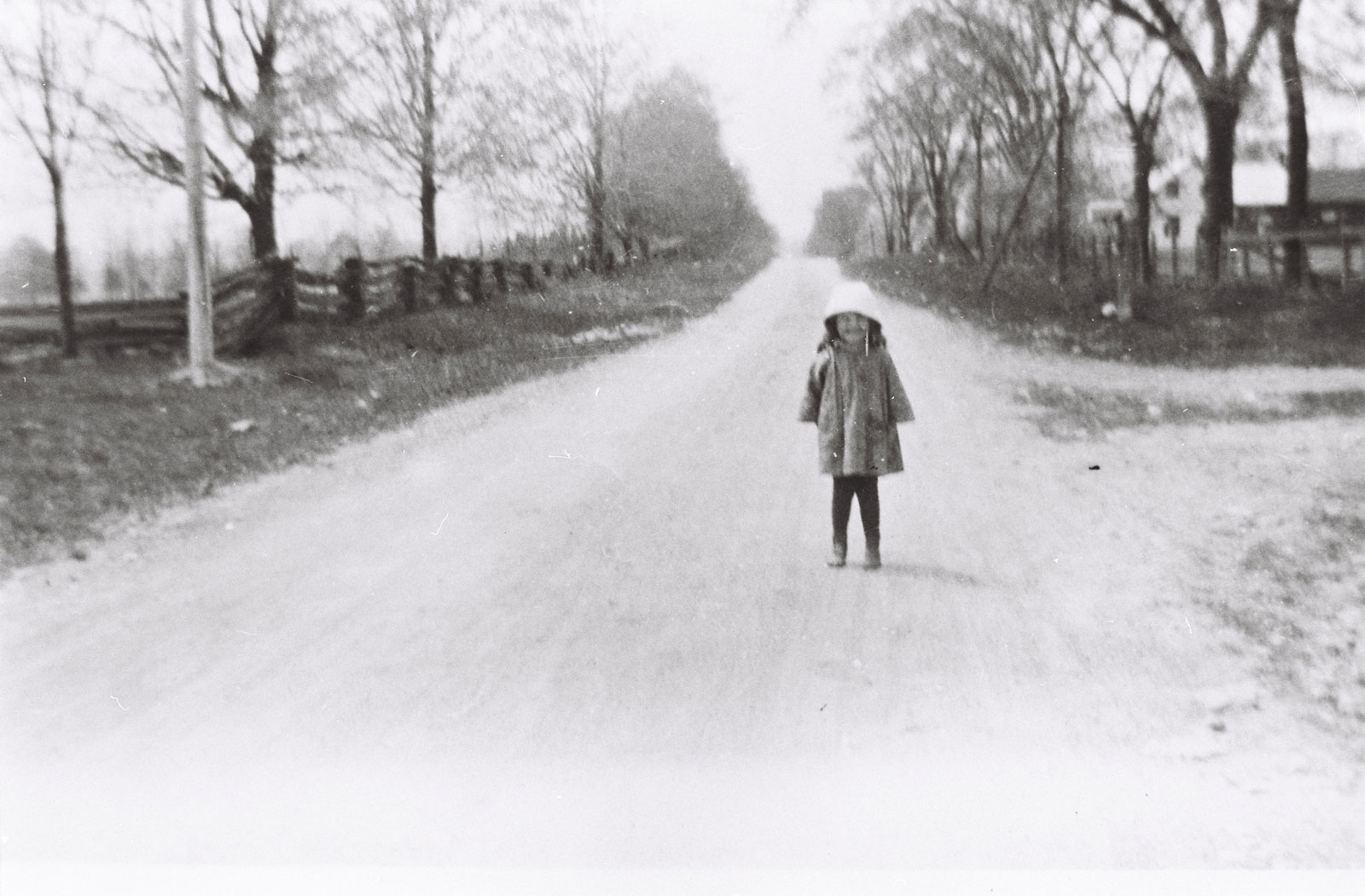 A child standing on what's now Hazeldean Road, east of Terry Fox. Photo from the collection of Roger Young.